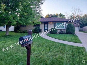 Building Photo - 3 Bedroom 1 1/2 bath brick ranch with 2 ca...