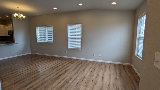 Building Photo - NEWER END UNIT TWO STORY TOWNHOME WITH A/C...