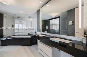 Building Photo - 2 br, 3.5 bath Condo - 18555 Collins Ave A...