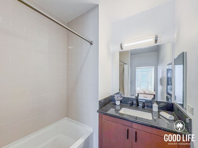 Building Photo - Luminous 2BD/2BA Apartment in East Village with Reserved Parking, City Views & Rooftop Amenities