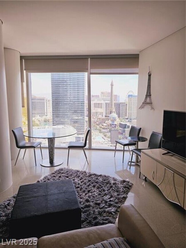 Building Photo - Unobstructed Strip Views-Fully Furnished 7...
