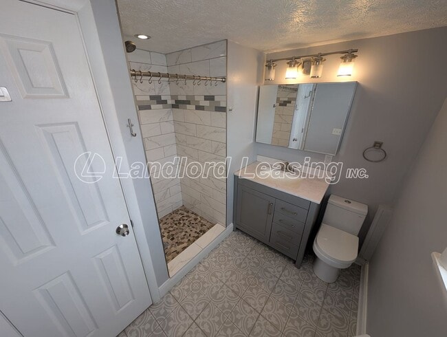 Building Photo - Updated 3-Bedroom Split-Level with Open Kitchen & Finished Lower Level