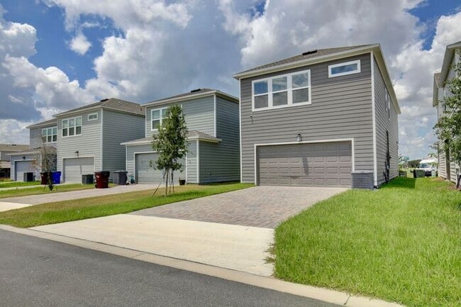 Building Photo - Pristine and Under a Year Old — 4 Bed, 2.5 Bath, 2-Car Garage, 2,071 Sq Ft