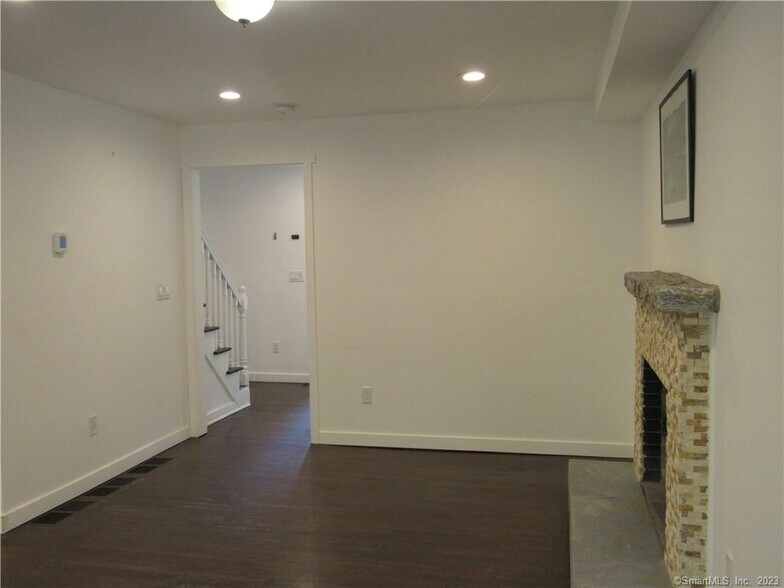 family room with fireplace - 63 Troiano Rd