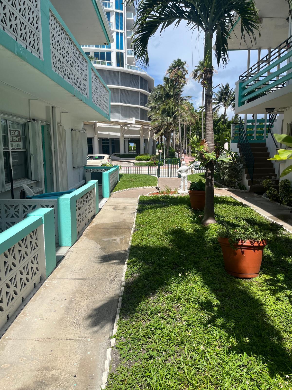 Building Photo - 6498 Collins Ave