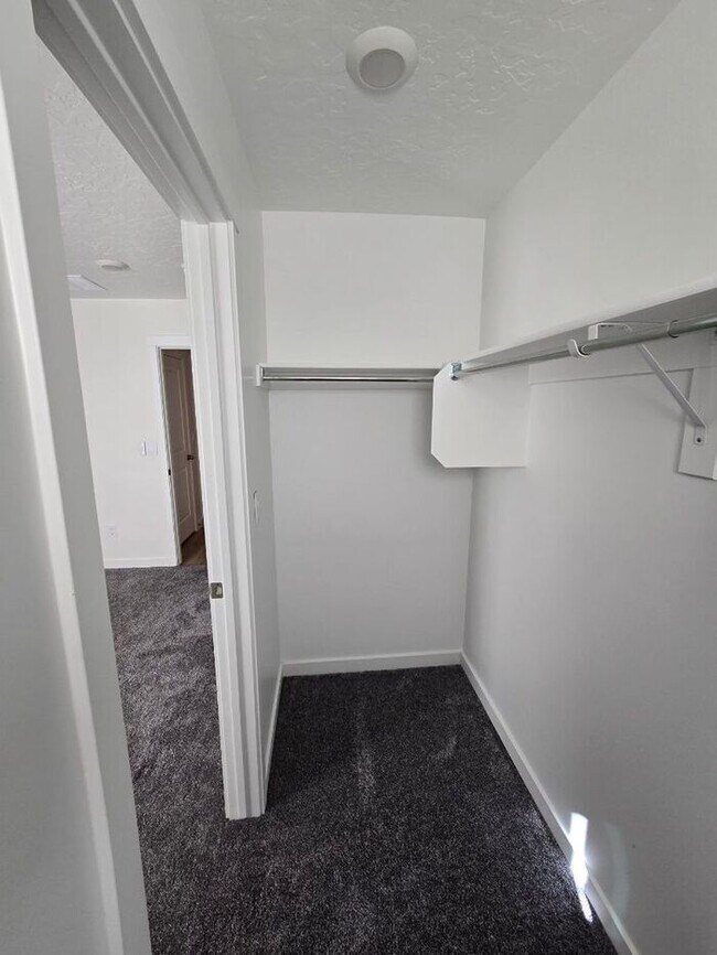 Building Photo - Nearly New, Well Appointed Modern Townhouse w 2 car attached garage