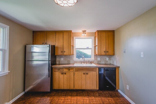 Building Photo - New Finishes in this Home on a Large Lot with Covered Parking and AIR CONDITIONING! MOVE IN READY!