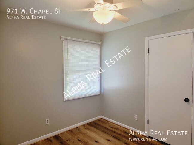 Building Photo - Pet friendly home with level fenced back y...