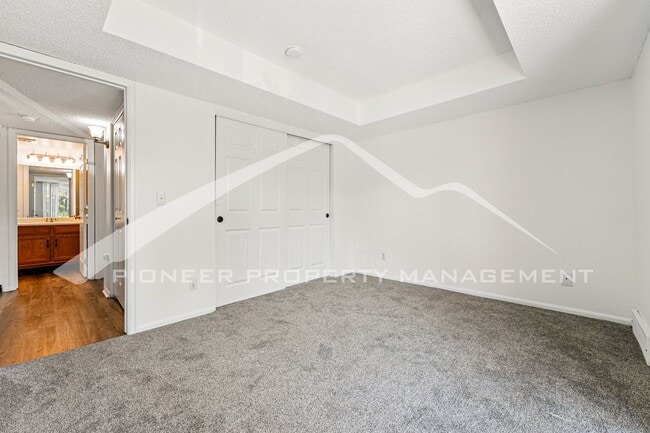 Building Photo - Charming Condo with Washer/Dryer and Patio