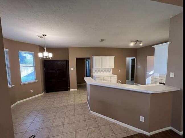 Breakfast Area and Kitchen view from Family Room with MB door entry - 3511 Misty View Ln