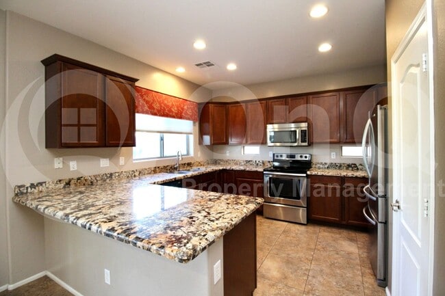 Building Photo - 11434 E Cliffrose Ln