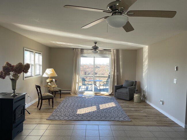 Living Room with access to oversized sunset deck - 387 Eichybush Rd