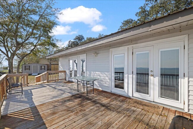 Building Photo - Stunning 4-Bedroom, 3-Bath Waterfront Home in Choctaw Beach – 140ft of Bayfront Bliss!