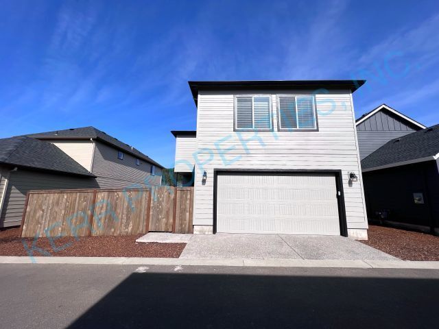 Building Photo - FREE RENT! Spacious 4-Bedroom Home in Happ...