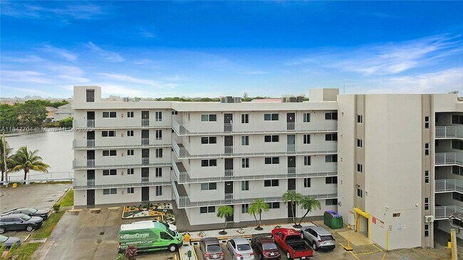 Building Photo - 9917 W Okeechobee Rd