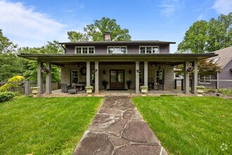 Building Photo - Charming Furnished Estate with Full-Servic...