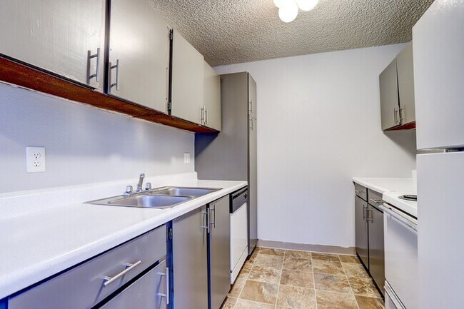 Building Photo - NOW LEASING : Spacious 2BR Upper Unit