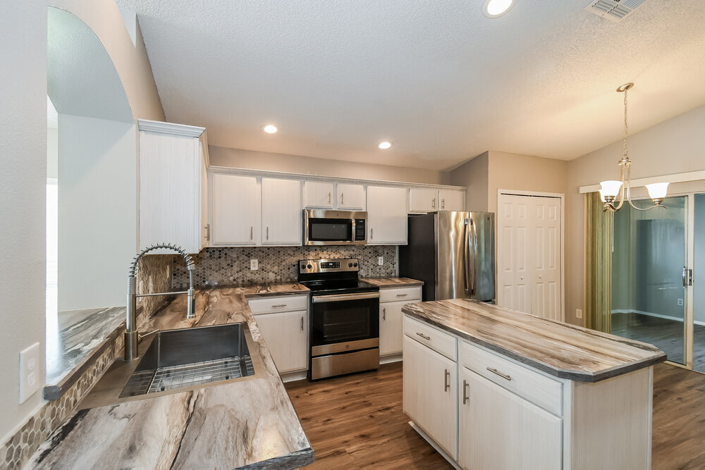 Building Photo - 3306 Lake Effie Ct N