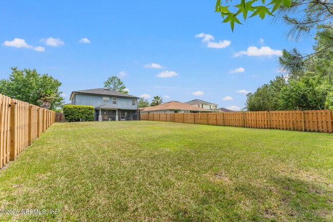 Building Photo - 75309 Ravenwood Dr