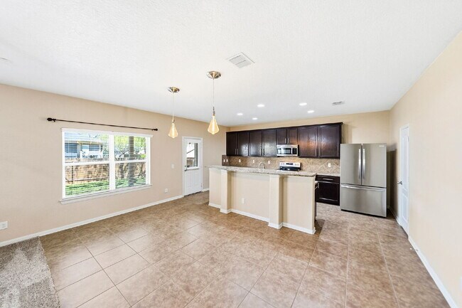 Building Photo - Where Game Nights, Backyard Gatherings, and Quiet Evenings Come Together