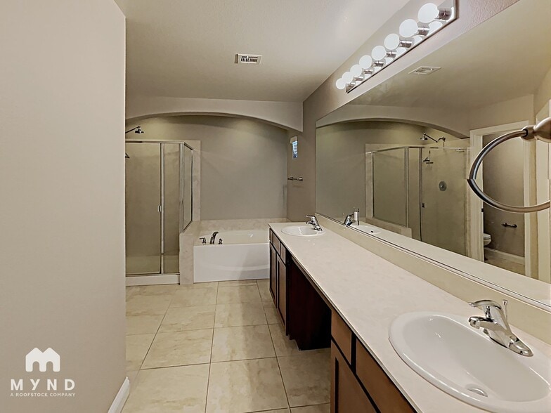 Building Photo - 6982 Castle Mountain Ave