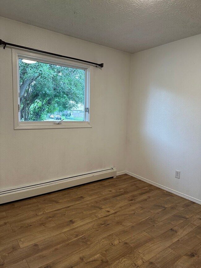 Building Photo - Discover Tranquil Living: Stylishly Updated Ranch-Style Duplex in South Anchorage