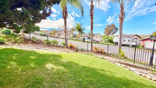 Building Photo - Beautiful Craftsman-style Home with fenced yard space, detached garage and additional parking in ...