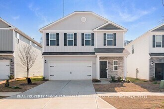 Building Photo - Stunning 4-bedroom, 2.5-bathroom home located in the vibrant city of Charlotte, NC.