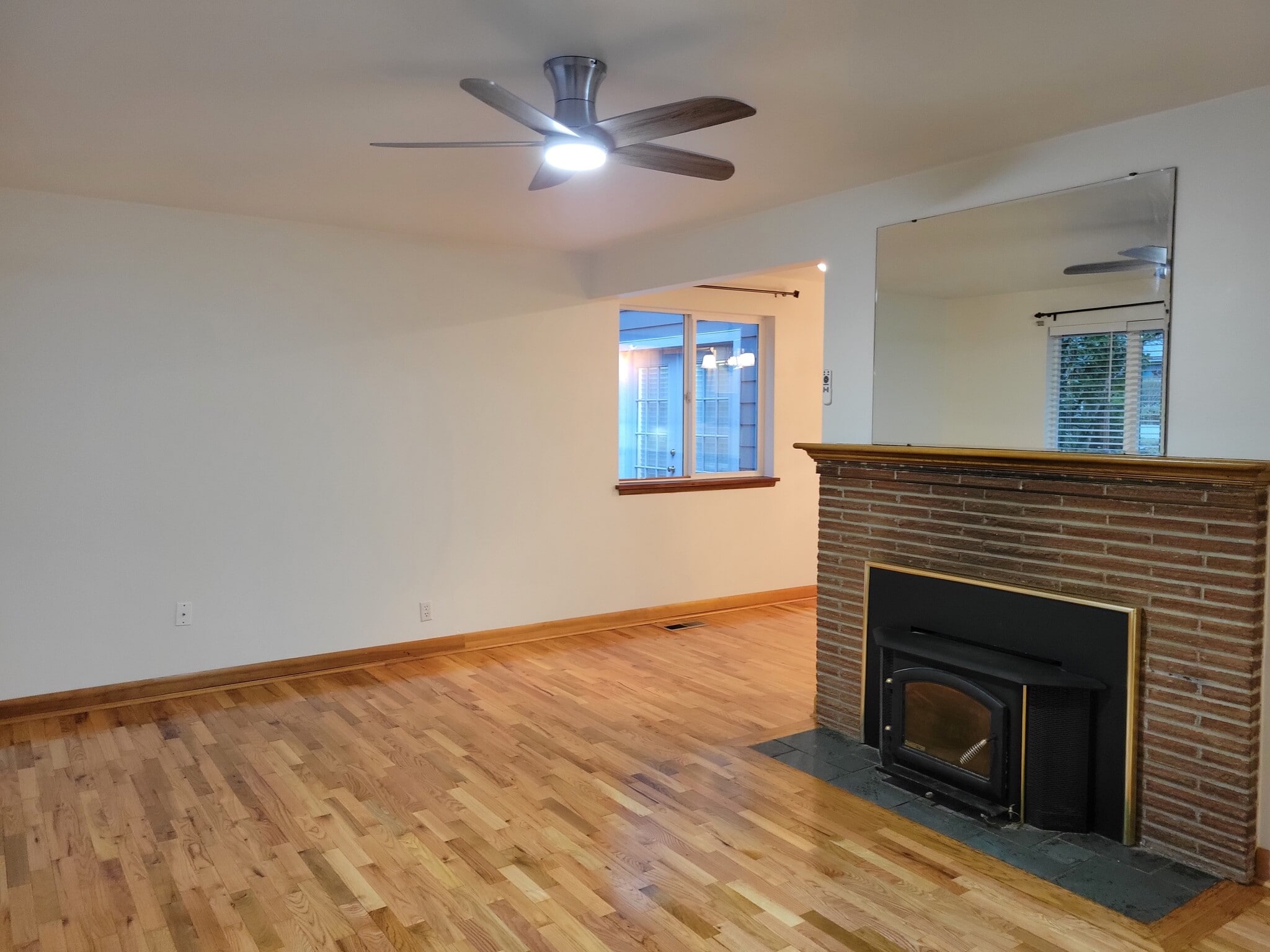 Fireplace insert and ceiling fan - 13344 23rd Pl NE