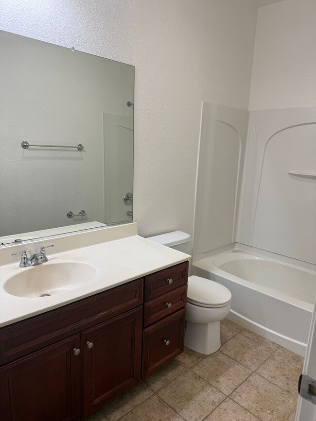 Building Photo - NICE 2-STORY CONDO 3 BED, 2.5 BATH, & 2 CAR GARAGE NEAR SHOPPING & HWY 50!