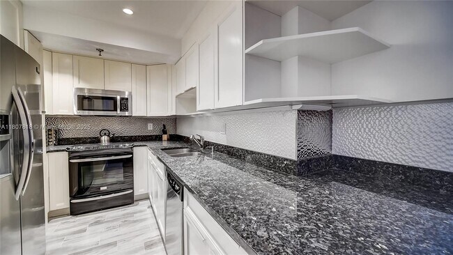 Building Photo - 2401 Collins Ave