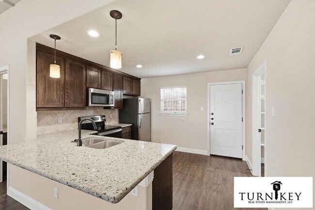 Building Photo - 1325-1329 White Sand Dr.