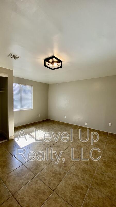 Building Photo - 3909 S 14th Ave