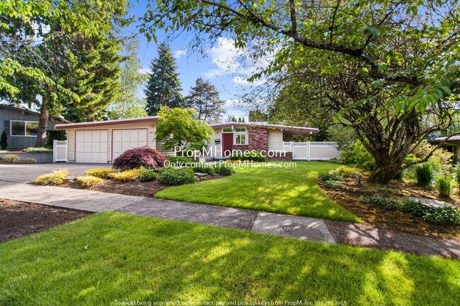 Building Photo - Mid-Century Dream Home: Three Bedrooms and a Converted Garage Await!