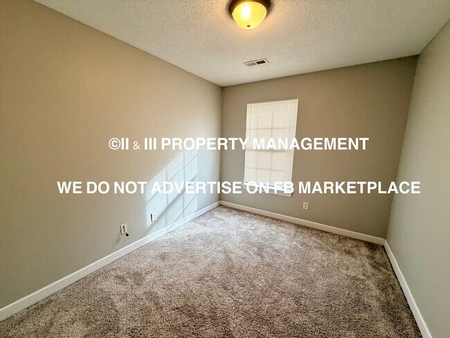 Building Photo - 921 SW Peach Tree Ln