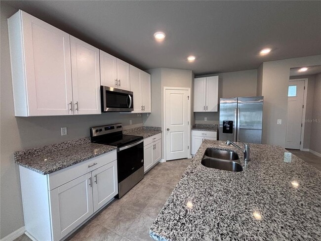 Building Photo - 7009 Feather River Pl