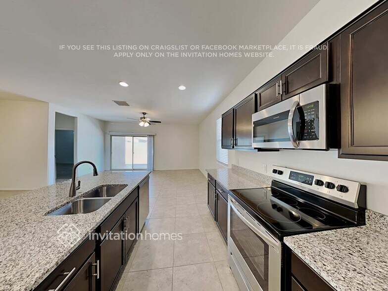 Building Photo - 37746 W Capri Ave