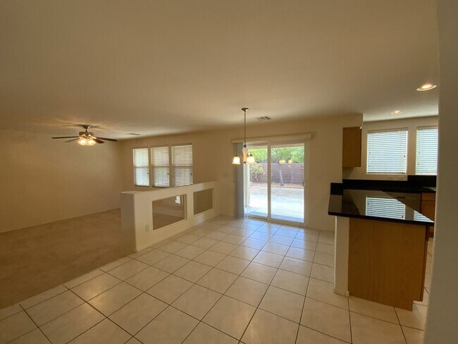 Building Photo - 4 bedrooms and 2.5 bathrooms 2-story home located in Henderson, NV!