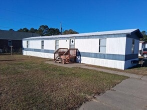 Building Photo - 6909 Sunbeam Ct