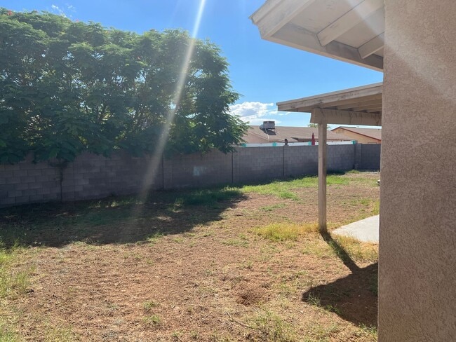 Building Photo - Four Bedroom Mountain View Home with large fenced back yard and double gates