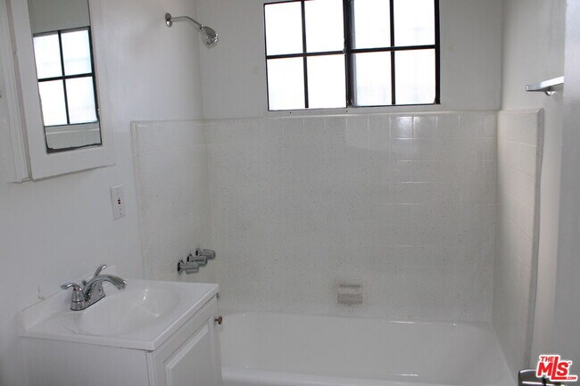 Building Photo - 6340 10th Ave