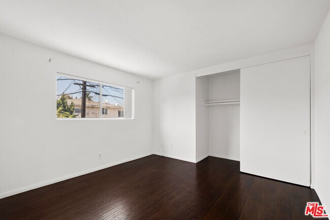 Building Photo - 3355 S Canfield Ave