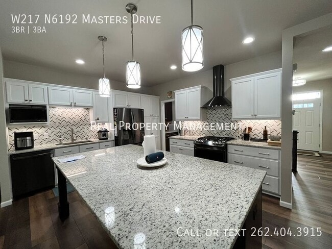 Building Photo - W217 N6192 Masters Drive-