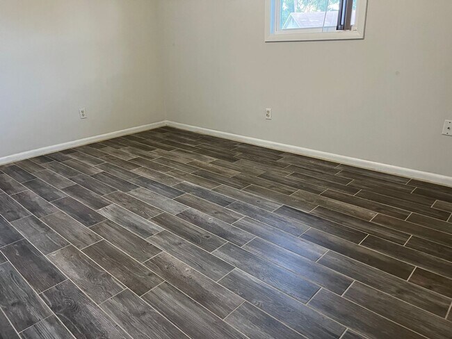 Building Photo - 5-Bedroom Brick Home on Spacious Corner Lo...