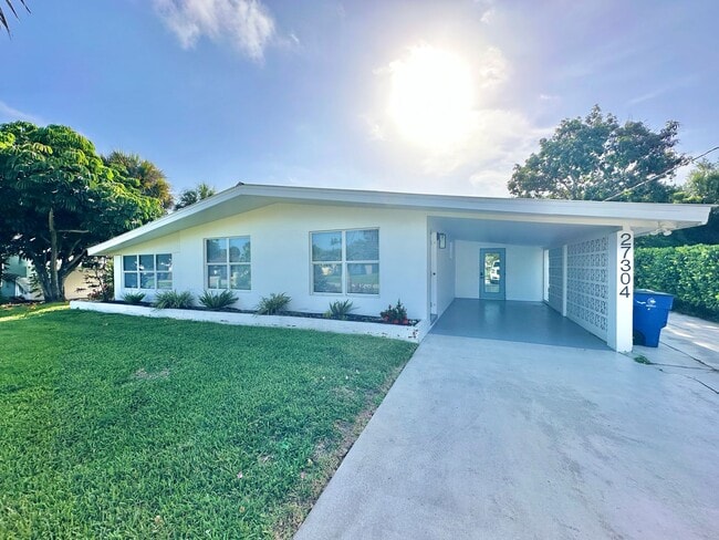 Building Photo - ** BONITA SPRINGS ** 3 BED / 1 BATH - SINGLE FAMILY HOME - NO HOA! - WATERFRONT LOT - ANNUAL RENTAL