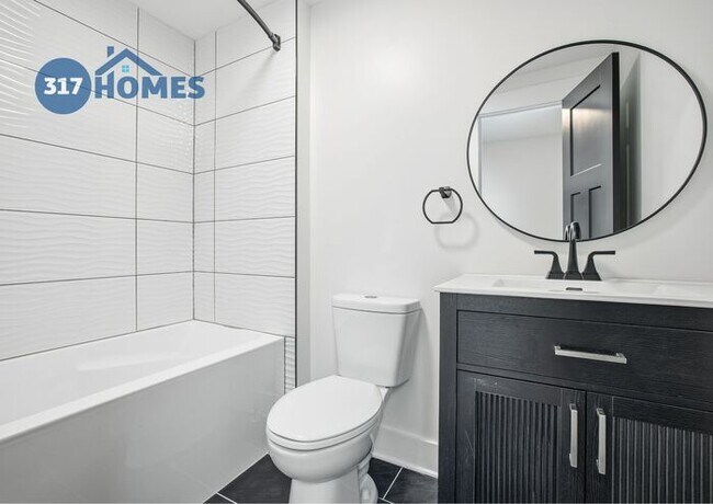 Building Photo - Spacious Four Bedroom Townhome with Main Level Suite in Holy Cross