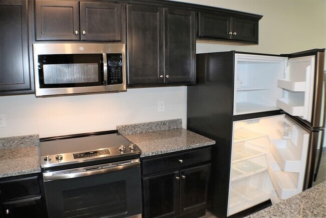 Building Photo - $1,285 | 1 Bedroom, 1 Bathroom Condo | ADA Compliant | No Pets | Available for Immediate Move In!