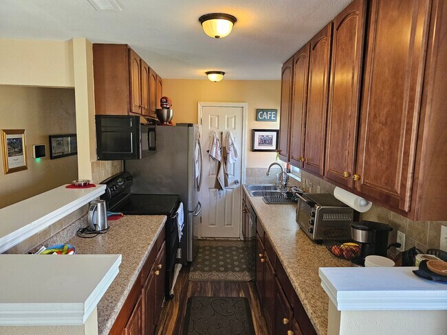 Building Photo - University Hills Charming Updated House 3 Bedrooms 1 Bath w/ Large Yard, Solar Panels & More
