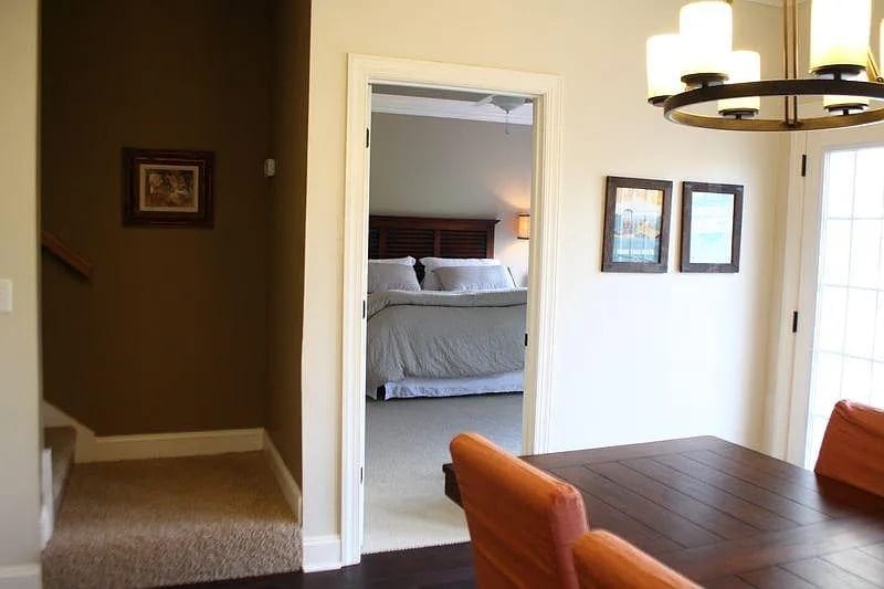 View of Master Bedroom and Entrance to Stairs from Dining Area - 1305 Westvale Dr