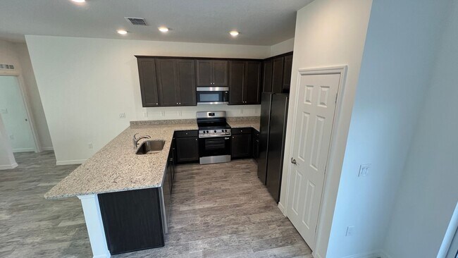 Building Photo - BRAND NEW! Be the FIRST To live here!